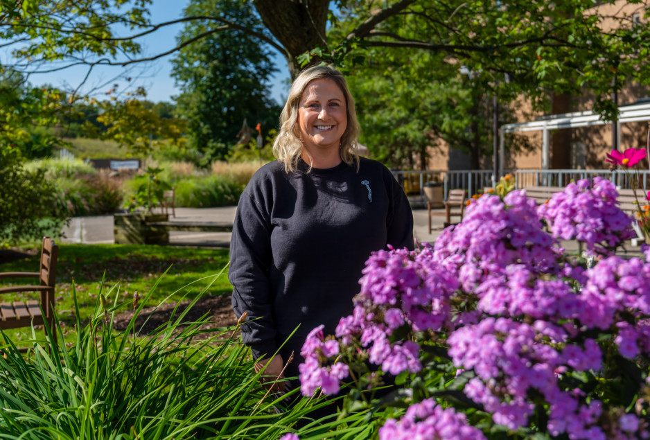 Breanne, staff member at Parkwood in the garden