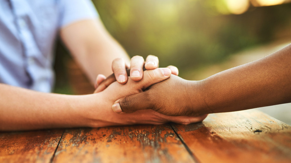 two people holding hands