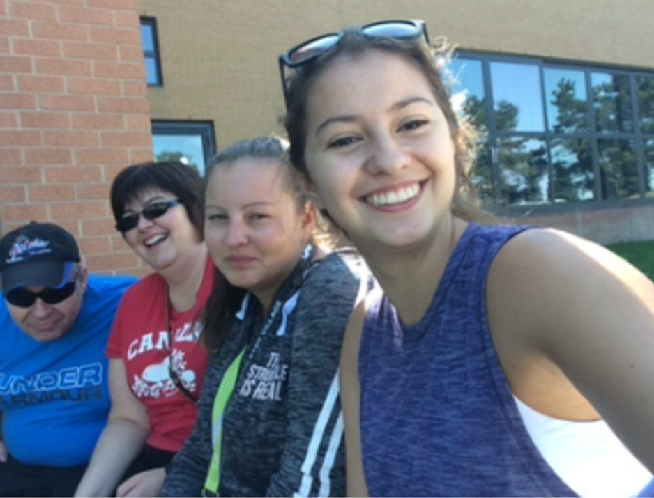 Granger family smiling in a selfie