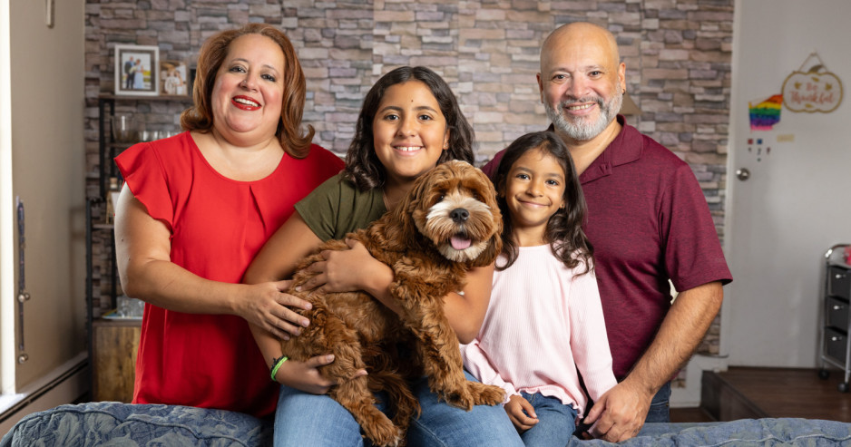 The Rivas family with their dog