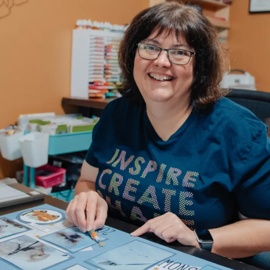 Anne Granger working on her scrapbooking