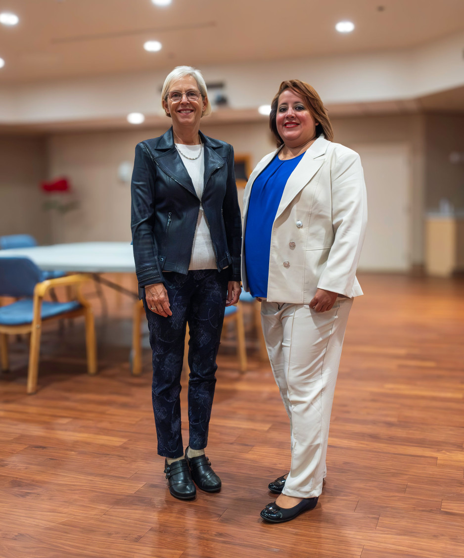 Care partners Healther McCallum and Fressia Rivas present their stories at the workshop