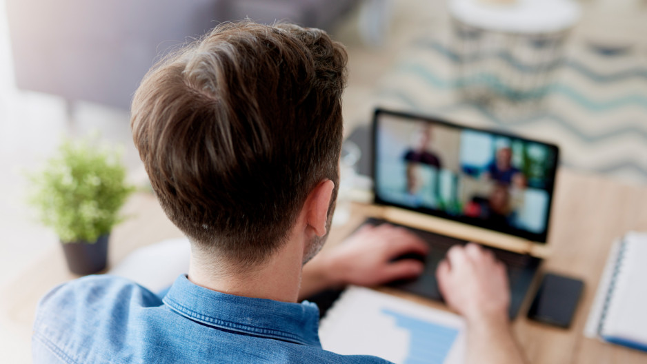 a man having a video conference at home office