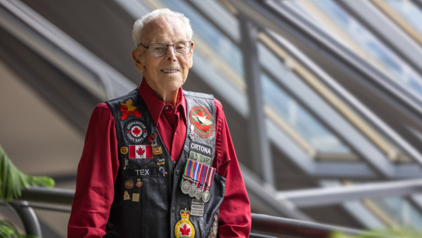 Tex wearing a Veterans vest